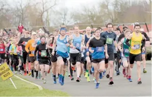  ??  ?? Winter Windsor Half Marathon gets underway. Ref:132348-2