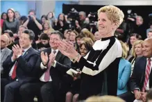 ?? FRANK GUNN THE CANADIAN PRESS ?? Ontario Premier Kathleen Wynne applauds staff and patients during a CAMH mental health funding announceme­nt in Toronto on Wednesday.