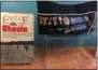  ?? PAUL POST — DIGITAL FIRST MEDIA ?? A display case ib the lobby of Saratoga County offices in Ballston Spa pays tribute to Korean War veteran Jack Downing of Milton.