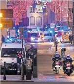  ??  ?? Police at scene in Strasbourg last night