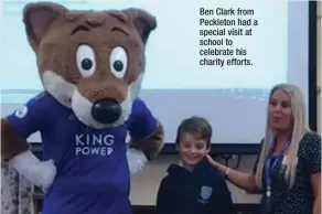  ??  ?? Ben Clark from Peckleton had a special visit at school to celebrate his charity efforts.