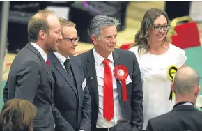  ?? Pictures: Kris Miller. ?? Top: the SNP’s John Alexander is congratula­ted by his wife; middle: Vari McDonald is comforted after losing her seat; above: from left: Michael Marra, Alan Ross, Charlie Malone and Roisin Smith.