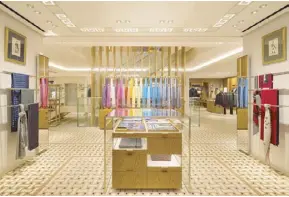  ??  ?? Hermès’ Men’s Universe on the ground floor features a rainbow spectrum of ties.