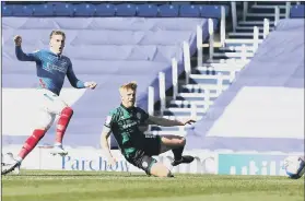  ??  ?? LOW BLOW Ronan Curtis fires home Pompey’s second goal