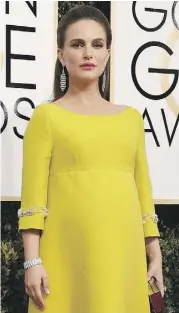  ?? GETTY IMAGES VALERIE MACON/ ?? Natalie Portman arrives at the 74th annual Golden Globe Awards on Jan. 8 in a dress that takes a cue from Kennedy.