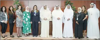  ??  ?? Mrs Salma Al-Hajjaj and Fawzi Al-Majdalli along with Gulf Bank and MGRP’s senior management teams.