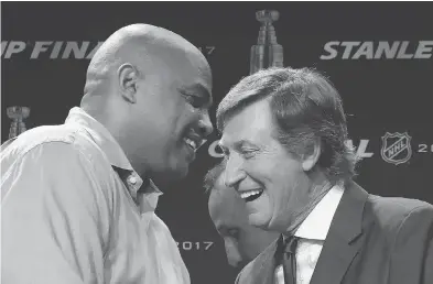  ?? FREDERICK BREEDON / GETTY IMAGES ?? Former NBA player Charles Barkley has become quite the hockey fan and joined Wayne Gretzky at a press conference before Game 4 of the Stanley Cup Final between the Nashville Predators and the Pittsburgh Penguins Monday.