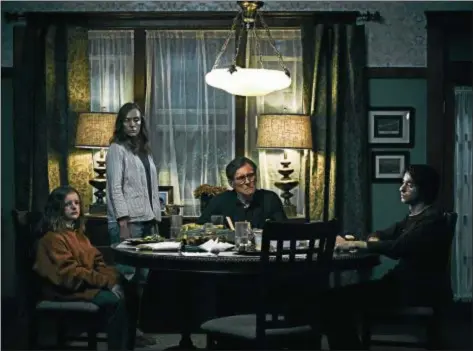  ?? A24 PHOTOS ?? Milly Shapiro, left Toni Collette, Gabriel Byrne and Alex Wolff portray a family that may be cursed in “Hereditary.”