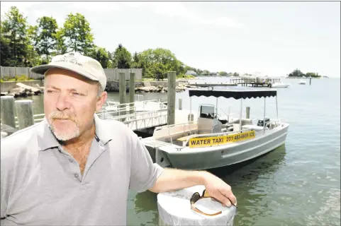  ?? Peter Hvizdak / Hearst Connecticu­t Media file photo ?? Capt. Bob Milne, owner of the Thimble Island Ferry and the Volsunga II in Stony Creek in July 2011.