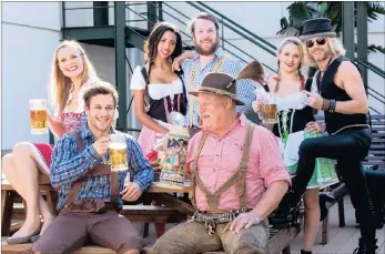  ??  ?? MUNICH MADNESS: Marie Stinnes, back from left, Danielle de Wet, Brendan Murray, Liza Visser, Frankie Hannigan, Stuart Calder, front, and Rainer Augustin have fun at last year’s bierfest