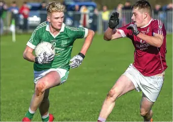  ??  ?? Red Og Murphy goes into attack mode against Shamrock Gaels at Bunninadde­n.