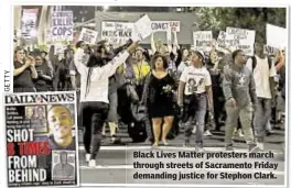  ??  ?? Black Lives Matter protesters march through streets of Sacramento Friday demanding justice for Stephon Clark.