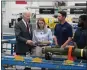  ?? THE ASSOCIATED PRESS ?? President Joe Biden speaks with employees during a tour of the Lockheed Martin Pike County Operations facility in Troy, Ala., Tuesday.