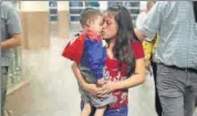  ?? AFP ?? A woman reunited with her son in El Paso, Texas.