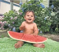  ?? PROVIDED ?? Bonnie Jean Feldkamp’s son Ezra sits on a blanket in the yard. Tests revealed high levels of lead in the soil.