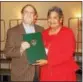 ??  ?? State Sen. Andy Dinniman, D-19, presents a certificat­e of appreciati­on to Carol Black, president of the board of directors of MLK CommUNITY of the Greater Kennett Area.