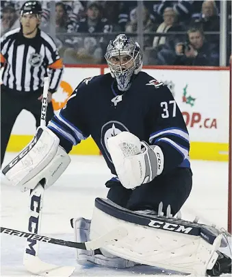  ??  ?? Jets goaltender Connor Hellebuyck has 18 wins in 27 starts and is approachin­g the 26 wins he had in 53 starts as a first-year NHL starter. Goaltendin­g has been the biggest source of improvemen­t for the Jets.