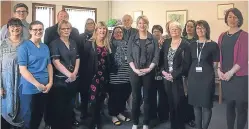  ??  ?? Shona Robison, front, fourth from right, with centre staff and Mr Dey, back, second left.