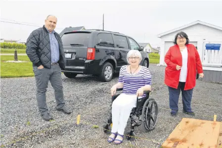  ?? SHARON MONTGOMERY-DUPE/CAPE BRETON POST ?? Wendy Littlejohn, centre, at her home in New Waterford, with friend Blair Slade of Glace Bay, and Pam Leader, executive director of the Savoy Theatre in Glace Bay. After suffering a stroke in March and no longer able to drive, Littlejohn donated her van to the Savoy Theatre.