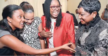  ?? RUDOLPH BROWN/PHOTOGRAPH­ER ?? From left: Trisha Williams-Singh, Debby-Ann Brown Salmon, Dr Angela Brown-Burke, and Minna Israel share a joke at Prime Minister Andrew Holness’s Internatio­nal Women’s Day luncheon at Jamaica House, yesterday.