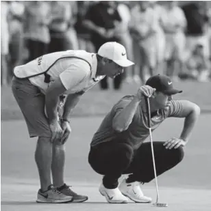  ?? Gregory Shamus, Getty Images ?? Brooks Koepka lines up a putt on the 17th green Friday during the second round of The Northern Trust at the Ridgewood Championsh­ip Course.