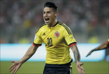  ?? AP PHOTO/ MARTIN MEJIA, FILE ?? In this Tuesday, Oct. 10, 2017filer, Colombia’s James Rodriguez celebrates after scoring against Peru during a 2018World Cup qualifying soccer match in Lima, Peru.