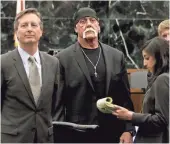  ?? DIRK SHADD, AP ?? Hulk Hogan, center, was awarded $140 million in damages. Wednesday, a judge denied Gawker’s motion for a new trial.