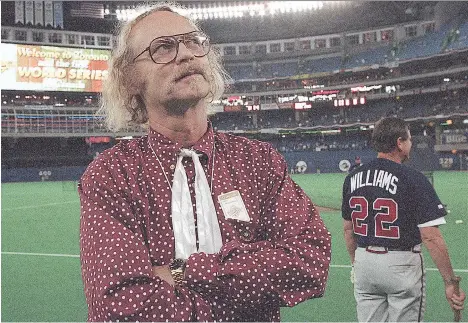  ?? RUSTY KENNEDY/ THE CANADIAN PRESS FILES ?? B.C.-based author W.P. Kinsella, seen here at the then Skydome in Toronto in 1992, wrote the award-winning novel Shoeless Joe. The book, about a farmer who builds a baseball diamond, became the film Field of Dreams. Kinsella died Friday at the age of 81.