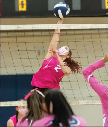  ?? Photos by Michelle Menard ?? Burrillvil­le senior captain Katelyn Paine (2) had a match-high 19 kills and 17 digs to lead the Broncos to a Division II sweep of rival Lincoln Tuesday night at the Broncodome. The Broncos improved to 3-2 with the win.