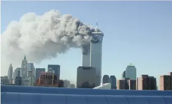  ?? Getty ImageS ?? FINAL MOMENTS: Smoke pours from the World Trade Center after being hit by two planes September 11, 2001 in New York City.