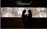  ?? ?? Two women stand in front of Chopard's booth at Watches and Wonders Geneva 2024.