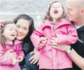  ??  ?? Jacob Forman of Rutland, near Kelowna, is shown with his wife, Clara Soledad Forman, and daughters, Yesenia Kate and Karina Anne.