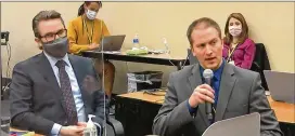  ?? COURT TV VIA AP, POOL ?? With defense attorney Eric Nelson at his side, former Minneapoli­s police Officer Derek Chauvin addresses Hennepin County Judge Peter Cahill during his trial for the murder of a Black man, George Floyd, while in his custody.