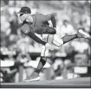  ?? TODD KIRKLAND/GETTY ?? Braves starter Mike Foltynewic­z allowed only three hits and struck out seven Friday.