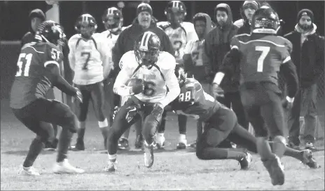  ?? Photo by Ernest A. Brownn ?? The Burrillvil­le football team is focused on slowing down Juanita Sanchez co-op All-State quarterbac­k Elijah Matthews (7) when the teams meet for the Division III Super Bowl for the second straight season. The contest takes place at Cranston Stadium...