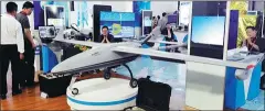  ??  ?? An unmanned aerial vehicle catches visitors’ eyes at the 11th China-Northeast Asia Expo in Changchun.