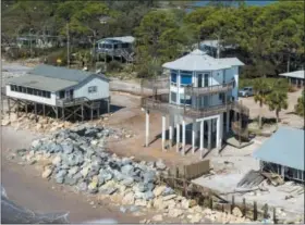  ?? SCOTT CLAUSE/ THE DAILY ADVERTISER VIA AP ?? Aerial photos of the aftermath of Hurricane Michael on St Teresa Beach, Fla., Thursday, Oct. 11.