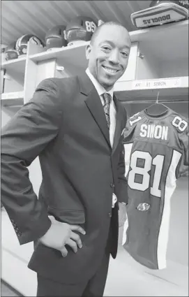  ?? Don Healy/postmedia News ?? Former B.C. Lions now Saskatchew­an Roughrider Geroy Simon after a news conference at Mosaic Stadium in Regina on Monday. The Roughrider­s picked up the 37-yearold Simon for receiver Justin Harper and a third-round 2014 CFL draft pick.