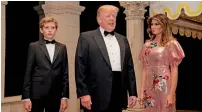  ?? AFP ?? US President Donald Trump, first lady Melania Trump and their son Barron arrive for a new year’s party at Trump’s Mar-a-Lago resort in Palm Beach, Florida. —