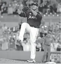  ?? WILFREDO LEE/THE ASSOCIATED PRESS ?? RIGHT: Marlins pitcher Edinson Volquez celebrates Saturday after completing a no-hitter against the Diamondbac­ks in Miami. Volquez struck out 10 batters and walked two, and the Marlins won, 3-0.