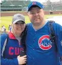  ?? SUSIE STRINGHAM ?? Dave Kreis with his wife, Susie Stringham, at Wrigley Field. Kreis, who was Sandburg’s athletic trainer for many years, died Nov. 11.