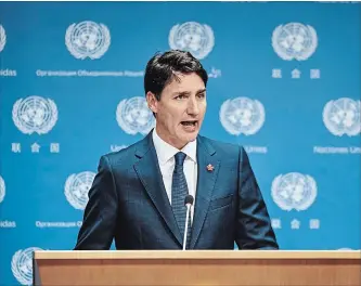  ?? ANDRES KUDACKI , THE ASSOCIATED PRESS ?? Justin Trudeau said a “NAFTA 2.0” deal would contain a “... lack of punitive tariffs that we consider are unjust.”