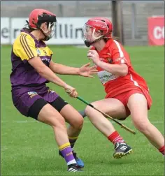  ??  ?? Midfielder Shelley Kehoe tries to close down Libby Coppinger.