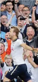  ??  ?? LONDON: Tottenham’s Harry Kane celebrates scoring a goal during the English Premier League soccer match between Tottenham Hotspur and Manchester United at White Hart Lane stadium. — AP