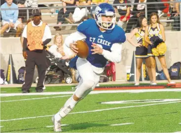  ?? Eddy Matchette / For the Chronicle ?? Cy Creek quarterbac­k Luke Allen put in his time during spring drills with the goal of leading the Cougars to the playoffs for the first time in five years.