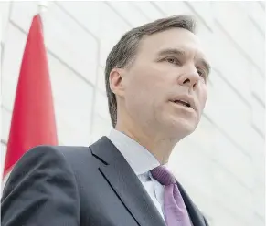  ?? — THE CANADIAN PRESS ?? Community Minister Peter Fassbender is looking to the budget from federal Finance Minister Bill Morneau Wednesday for funding of transit and affordable housing.