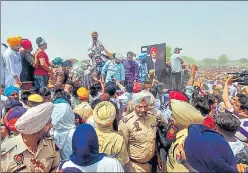  ?? PTI ?? Sidhu Moosewala’s father Balkaur Singh accepts condolence­s from supporters and fans of the Punjabi singer during his last rites, in Mansa district, Tuesday.