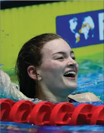  ??  ?? Swimming sensation Mona McSharry wins Gold at the World Junior Swimming Championsh­ips