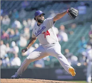  ?? TED S. WARREN — THE ASSOCIATED PRESS ?? Dodgers relief pitcher Kenley Jansen struck out two of the three batters he faced in the ninth inning.