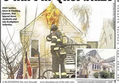  ??  ?? FDNY battles blaze in Flushing, Queens, that injured three residents and two firefighte­rs Saturday.